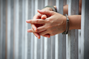 jail_bars_hands