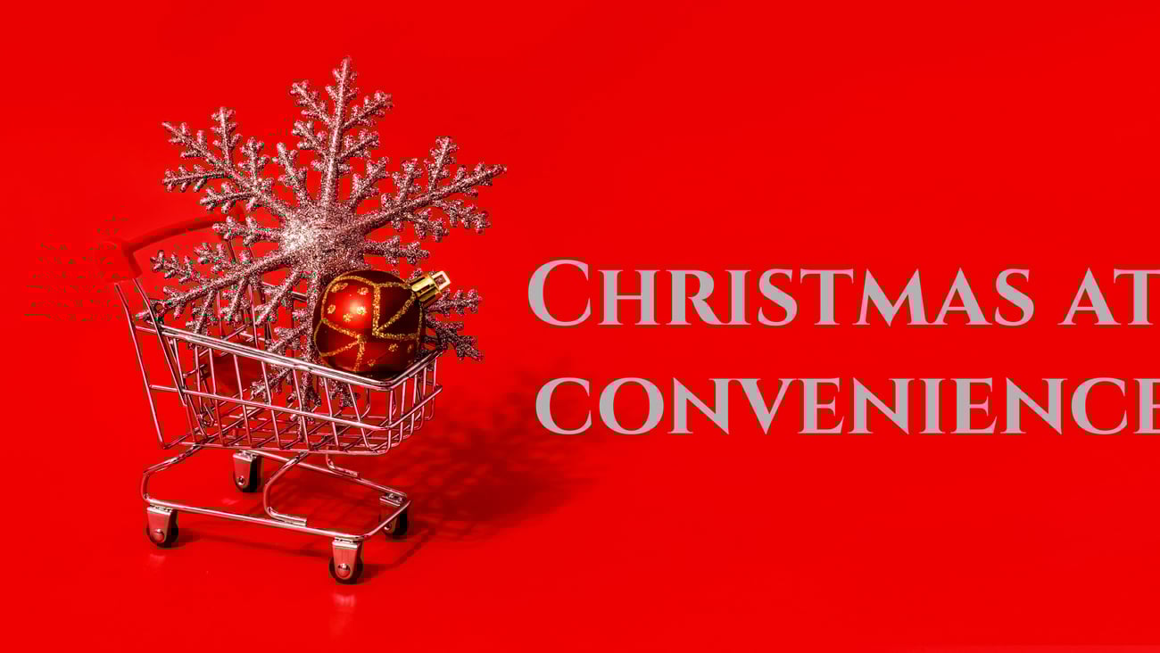 Shopping cart with snowflake and words Christmas and convenience