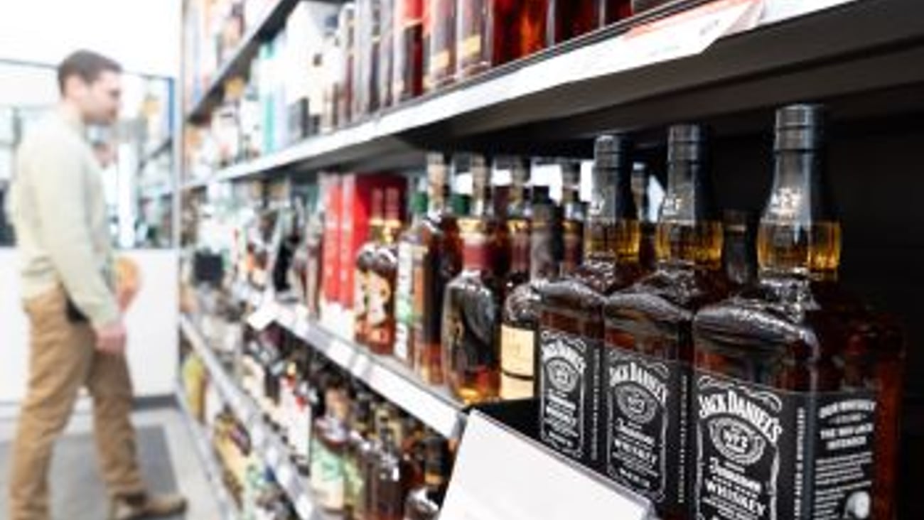 Shopper buying booze teaser