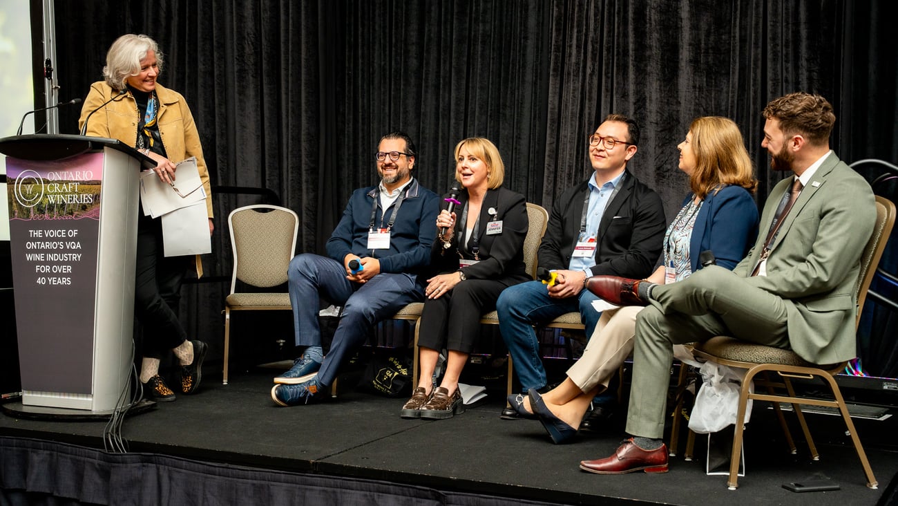 Carolyn Hurst, president and co-founder, Westcott Vineyard, moderated.   Seated from left: Giancarlo Trimarchi, president, Vince's Market; Jennifer Gordon, assistant general merchandise manager, cooler, liquor, sundries, tobacco, Costco Wholesale;  Lucas Babando, category manager, beer, RTDs, cider and wine, Circle K; Anne Kothawala, president and CEO, CICC; and Sebastian Prins, director of government relations (Ontario), Retail Council of Canada 