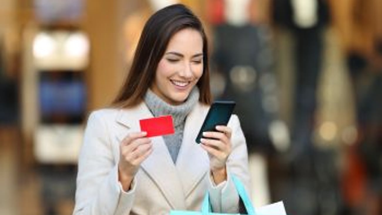 Woman using a gift card