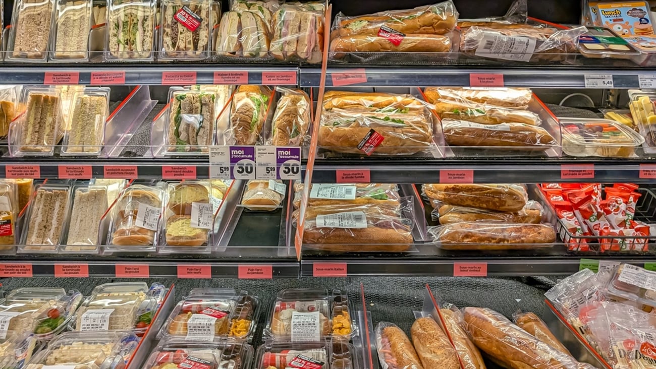 refrigerated shelf of ready to go sandwiches and snacks