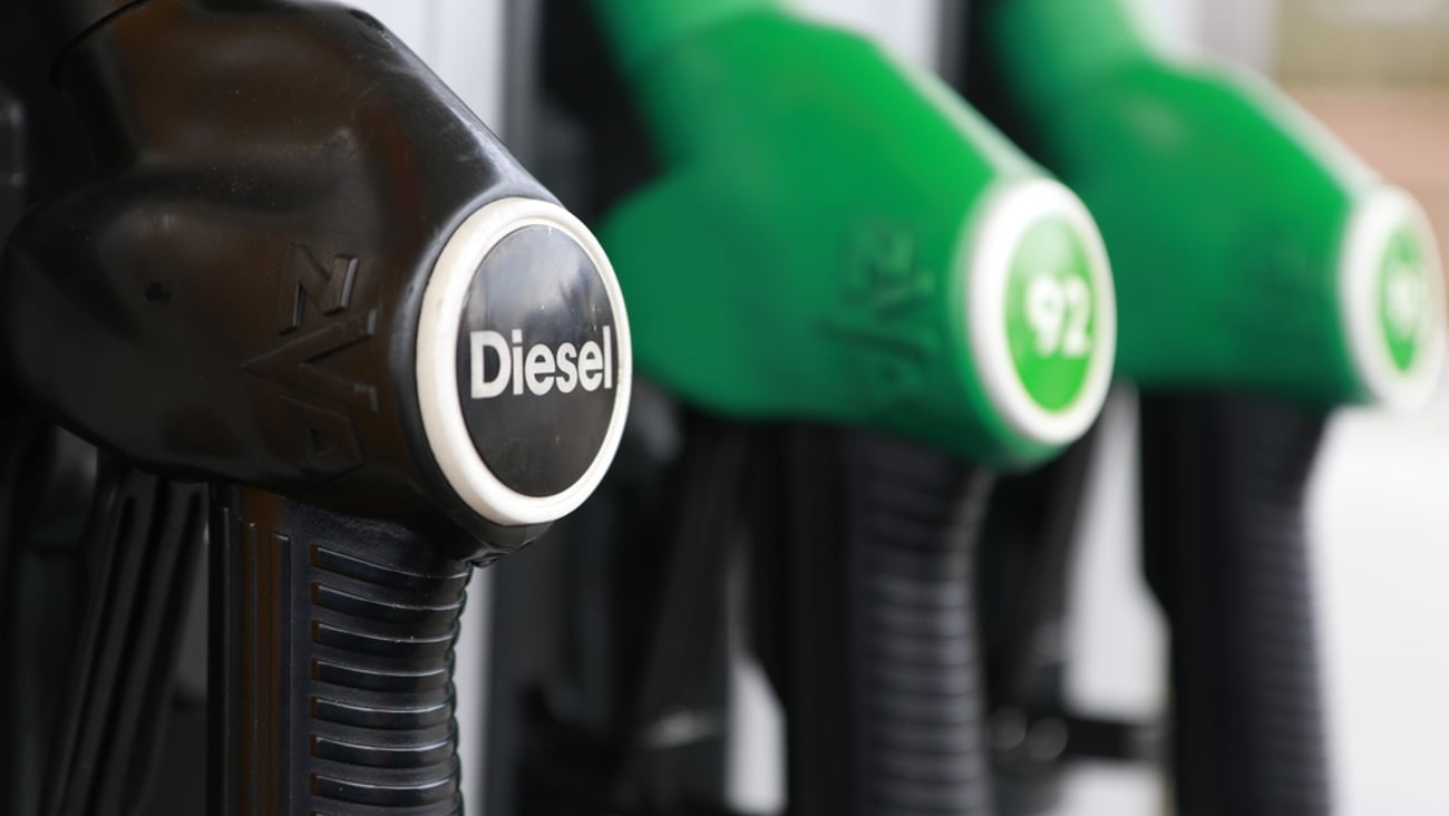 Close up of diesel pump handles at a gas station