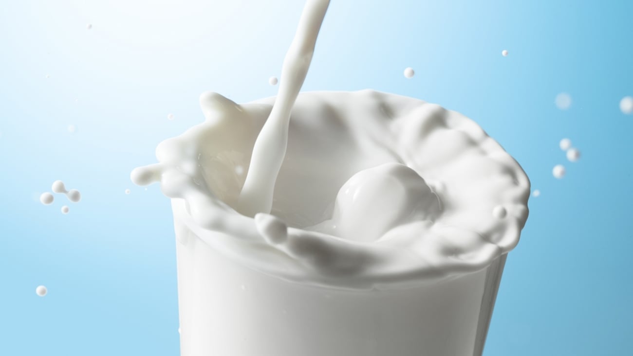 Milk being poured into a glass