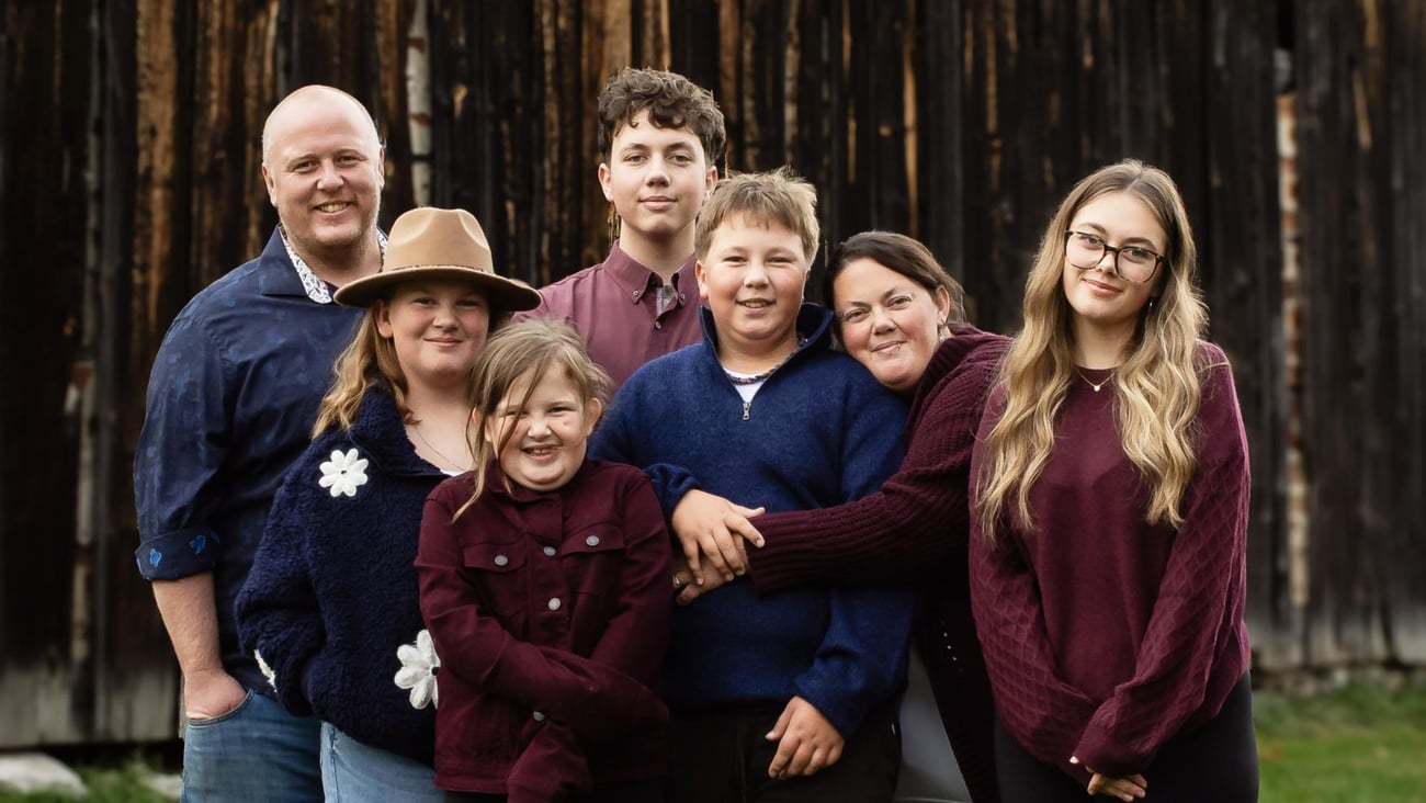 Winners of 2026 OIAC awards and Kenny's Store owners, Amanda and Derek Kenny with their family