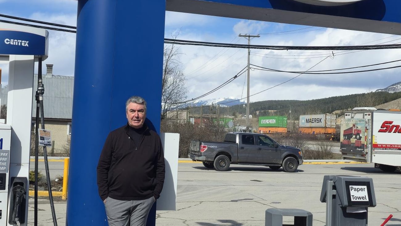 Owner, Mark Baxendale stands in front of the pumps in Mountain Mart's forecourt