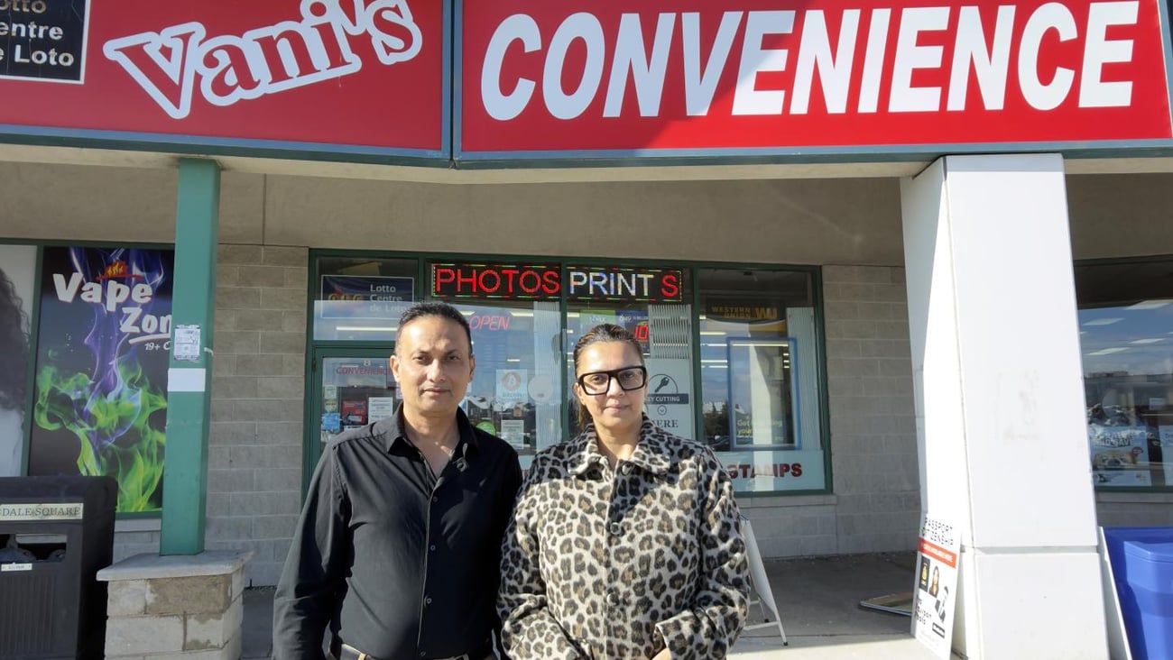 Owners: Vani and Manish Thakker in front of their store, Vani's Convenience