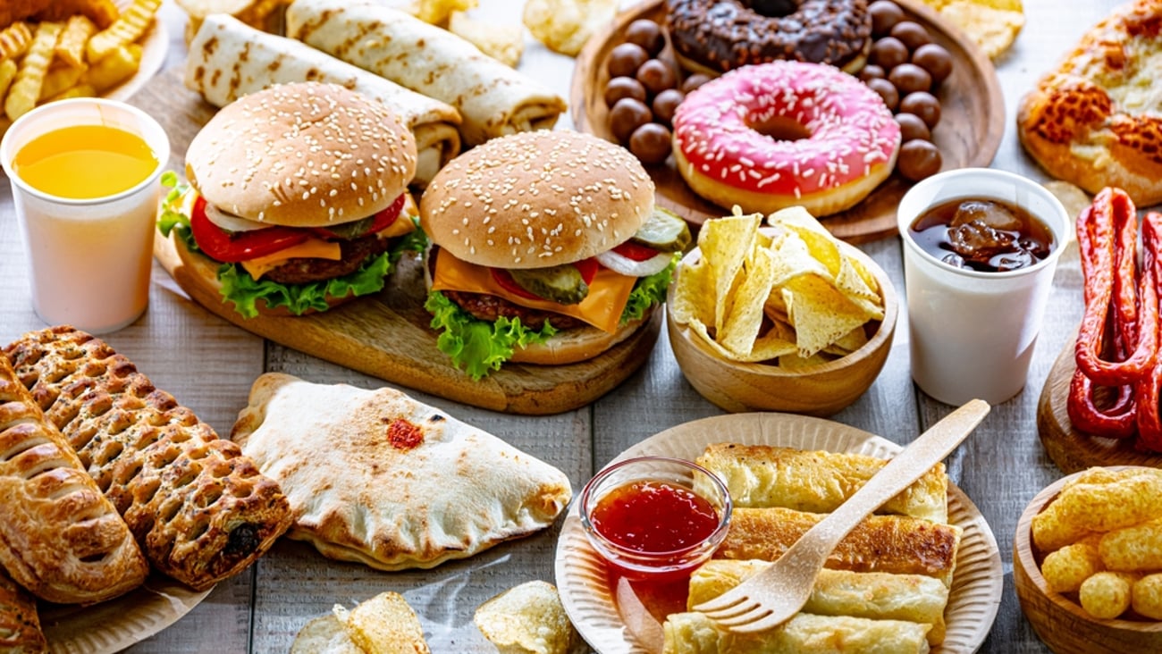 an array of snacks, fast food and soft drinks