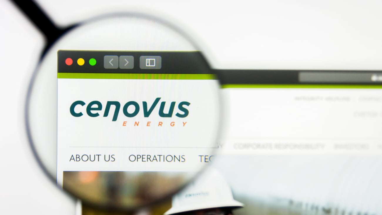 Magnifying glass on the top left corner of a computer screen, highlighting Cenovus logo