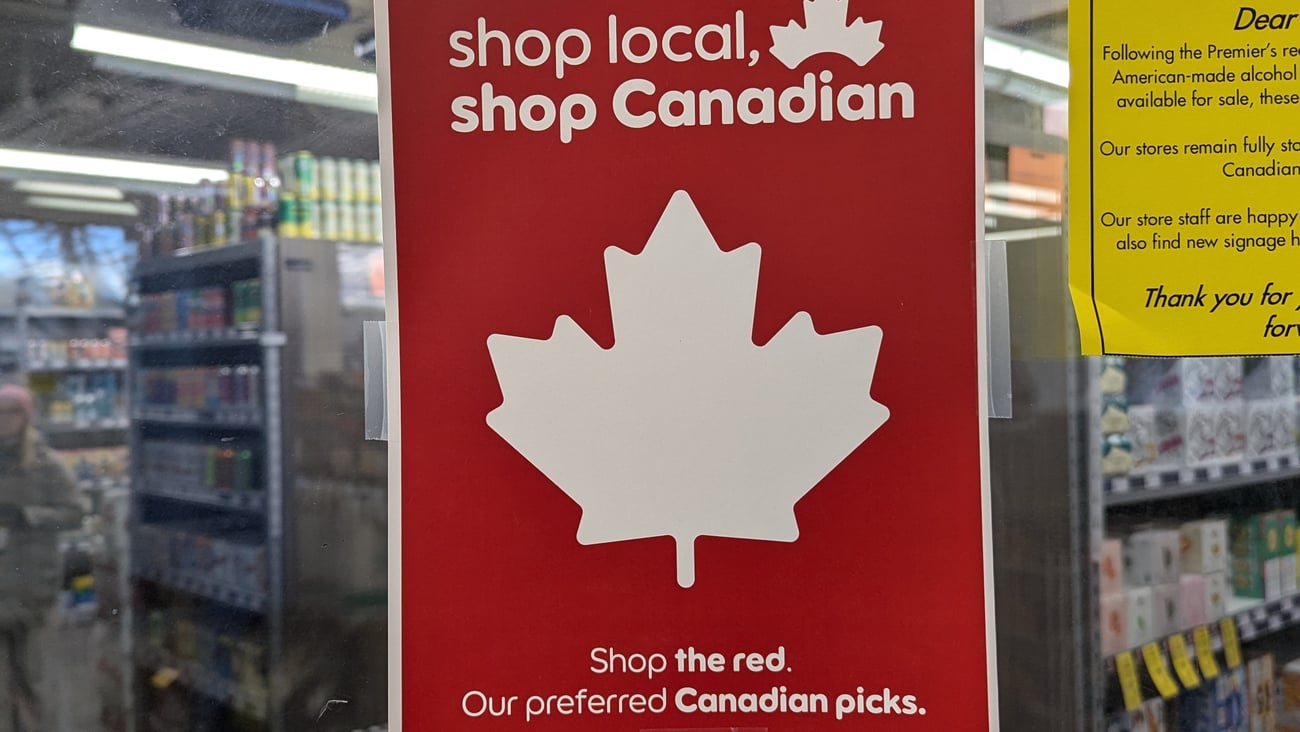 Buy Canadian sign in Banff liquor store