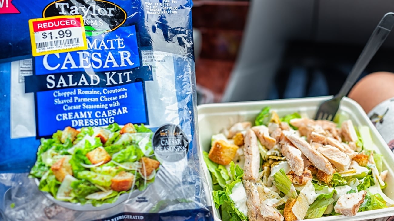 Taylor farms salad kit and a takeout salad