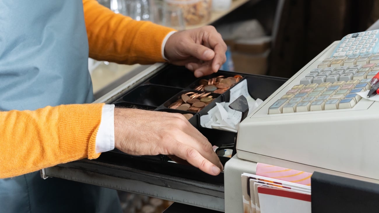 cashier handling money