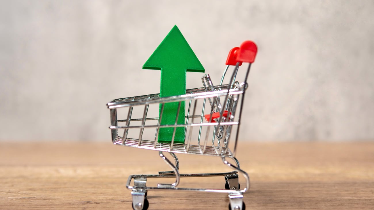 shopping cart with upward arrow
