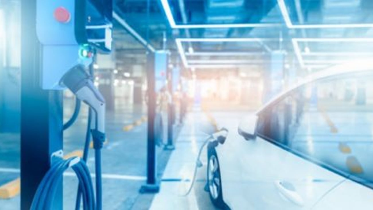 Electric vehicle charging station stock image teaser