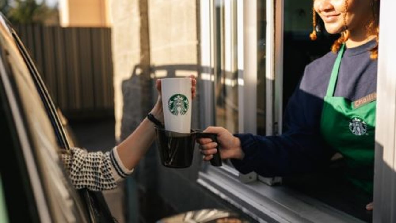 Starbucks customer at drive thru window