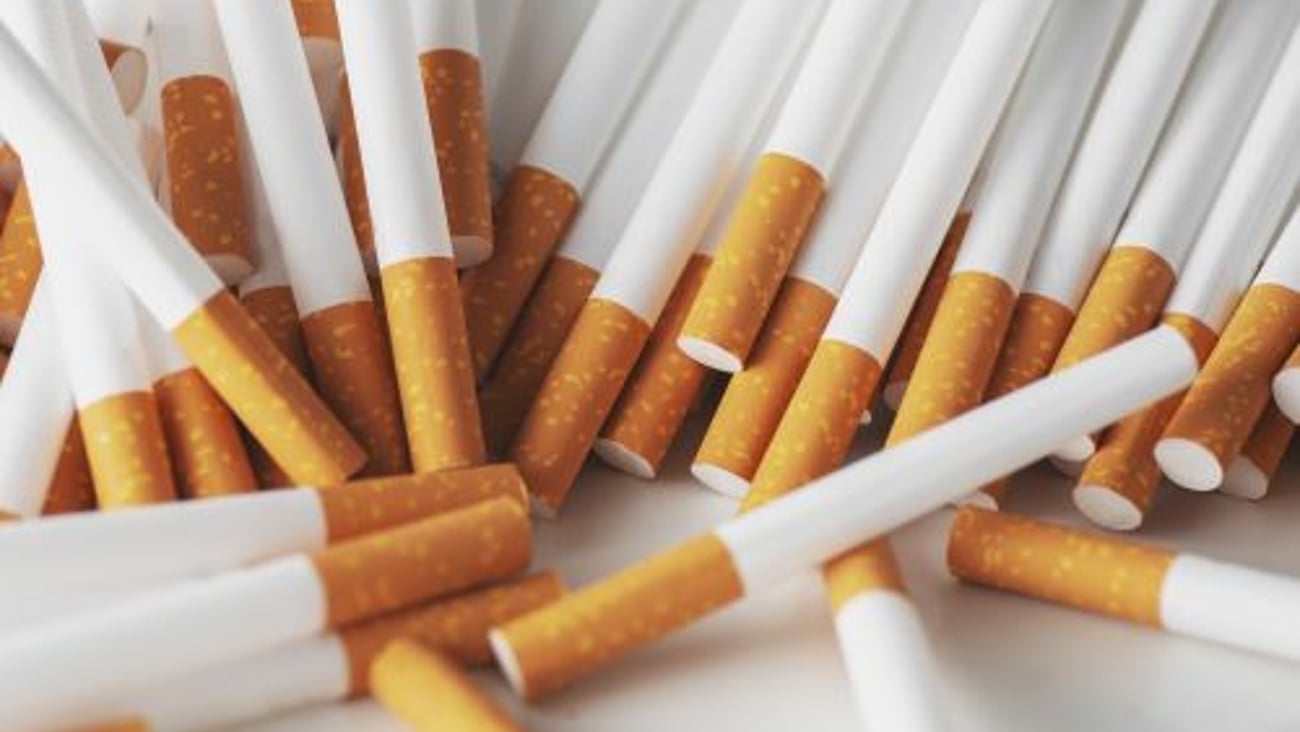 Cigarettes stacked close up stock image