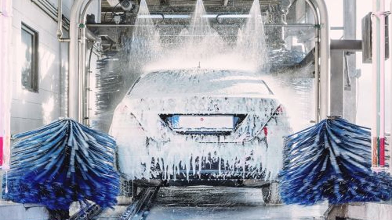 Vehicle in a tunnel covered in soap