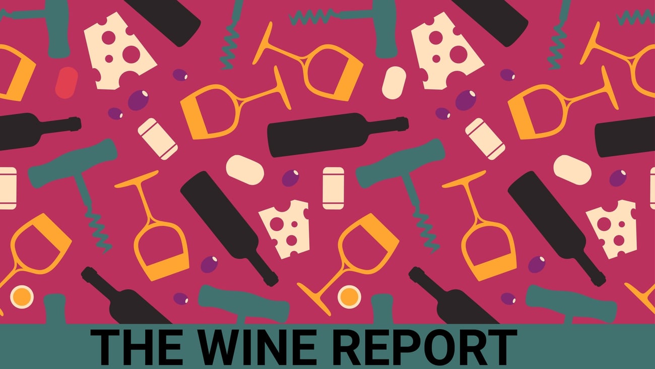 The Wine Report with bottles of wine an accessories on burgandy background