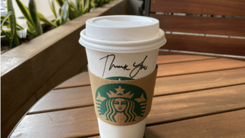 Starbucks cup with Thank You written on it