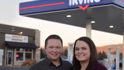 Marc and Valérie Desjardins in front of their new irving gas station