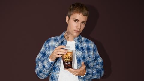 Justin Bieber with a Tim Hortons drink