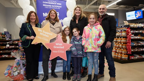 Michaela's family at the Make A Wish presentation with Anne