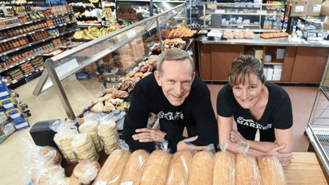 Dan and Tracy Fehr pose with freshly made bread. 