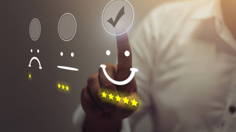 Person ranks customer satisfaction report with a smiley face and five stars.