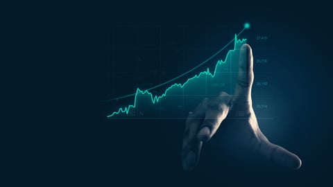 finger points to a rising line graph suggesting rising prices