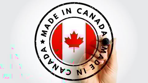 A hand writing Made in Canada