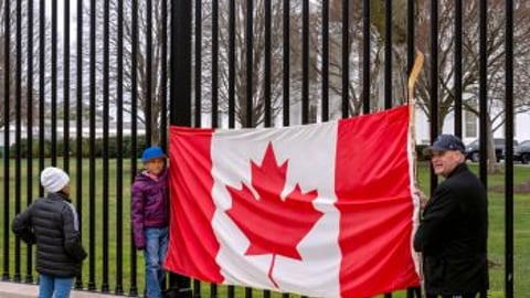 Canadian flag at tariff protest in US CP Teaser
