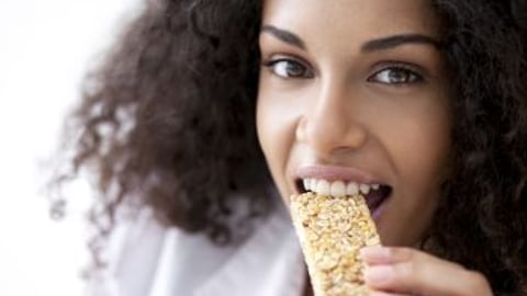 Woman enjoying a healthy snack stock image
