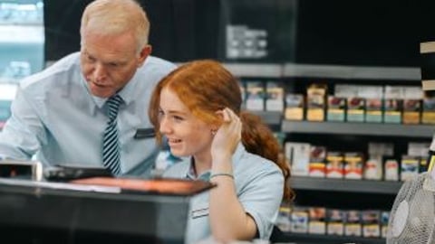 Manager training new employee stock image teaser