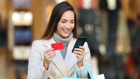 Woman using a gift card