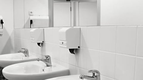 Clean workplace washroom stock image teaser