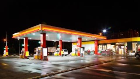 Gas station at night stock image teaser