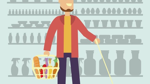 Cool guy with goatee who has impaired vision in a store