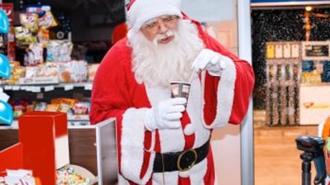 Santa in a convenience store stock image