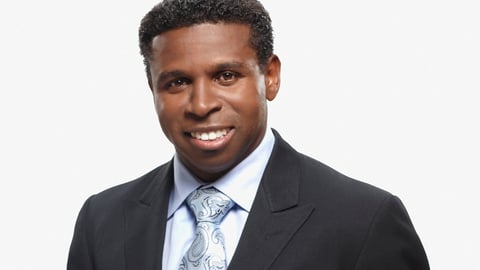 Michael Pinball Clemons in a suit