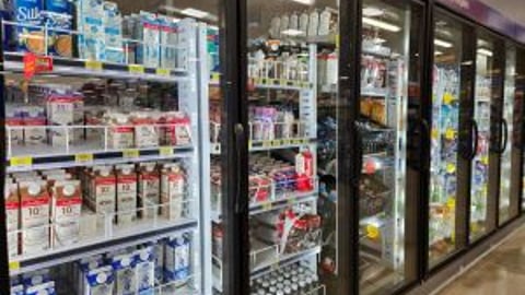 Milk cartons in a store cooler teaser