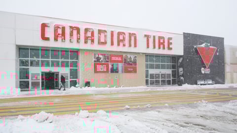 Canadian Tire store with snow on sign and snow in foreground