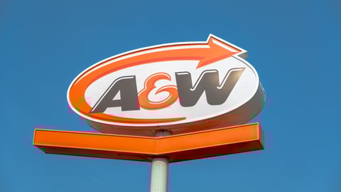 A&W sign outdoors against blue sky
