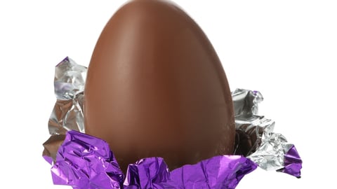 A half-unwrapped chocolate egg