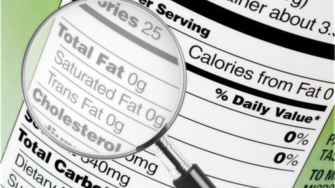 Label on food container with magnifying glass