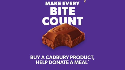 Mondelez international logo for Cadbury, featuring a square of chocolate with a bite take out of it and the charity's logo: Make Every Bite Count.