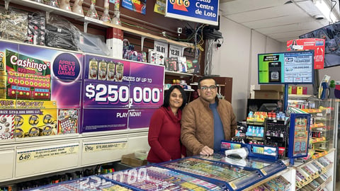 Divya and Paraskumar Shah at the counter inside their Daisy Mart store