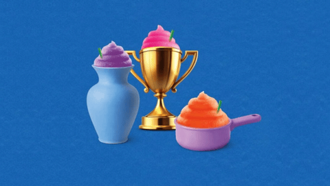 Image courtesy of 7-Eleven: A vase, trophy and a measuring cup filled with brightly coloured Slurpees.