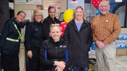 City councillors stand with Valet Car Wash staff