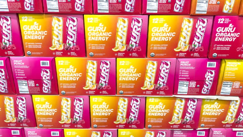 stacked cases of Guru Energy drinks