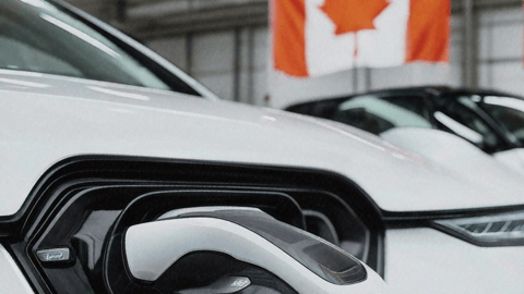 charging EV with Canadian flag in background